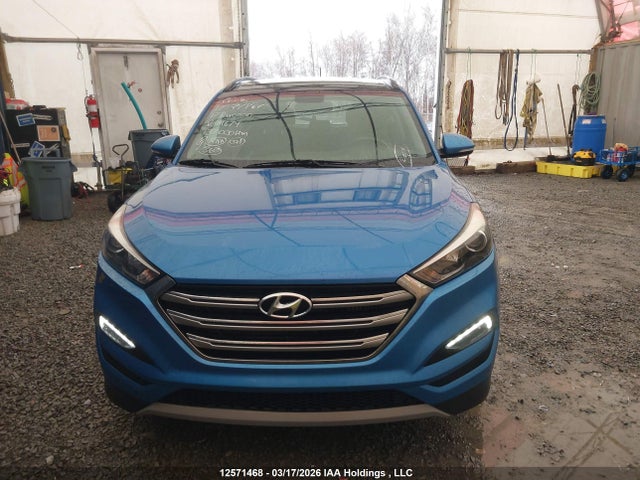 KM8J3CA26HU411674 Hyundai TUCSON SE