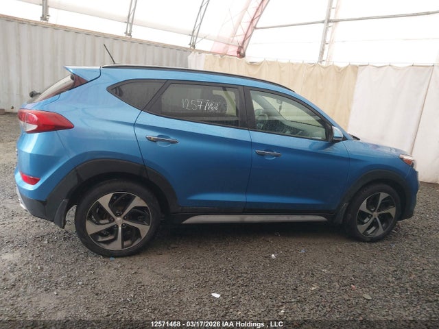 KM8J3CA26HU411674 Hyundai TUCSON SE