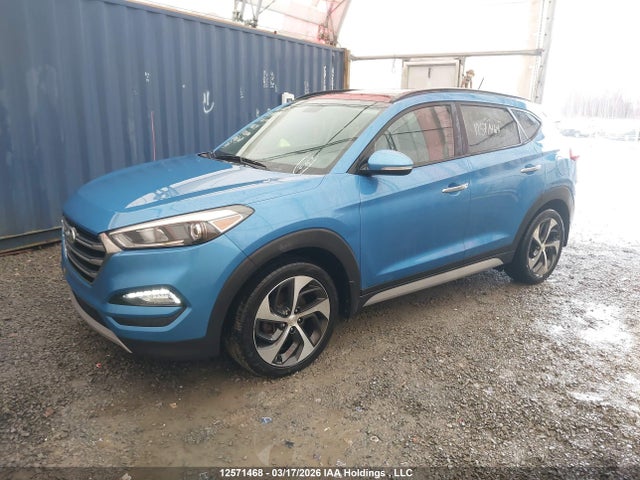 KM8J3CA26HU411674 Hyundai TUCSON SE