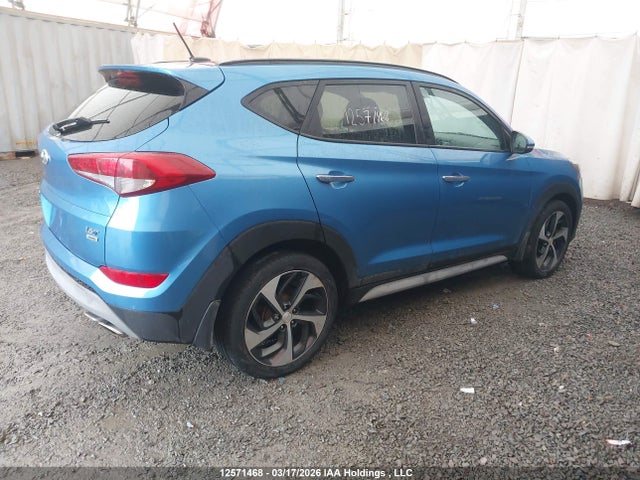 KM8J3CA26HU411674 Hyundai TUCSON SE