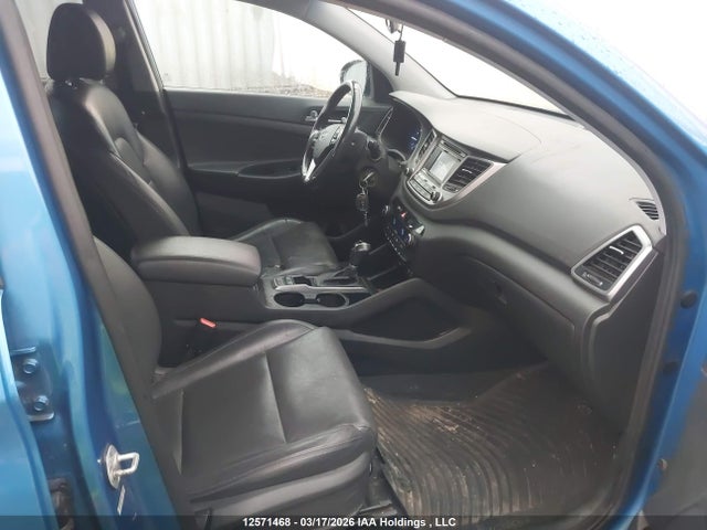 KM8J3CA26HU411674 Hyundai TUCSON SE