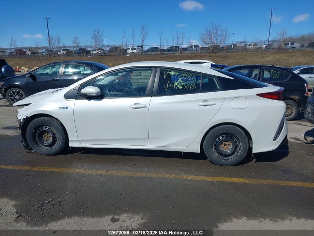 JTDKAMFP9M3185848 Toyota Prius