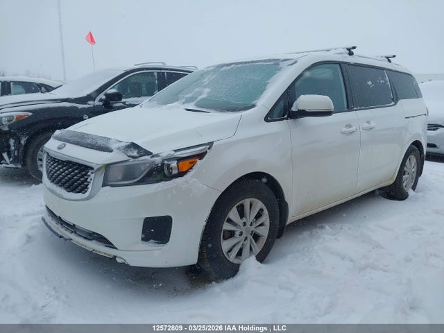 KNDMB5C10J6352703 KIA SEDONA LX