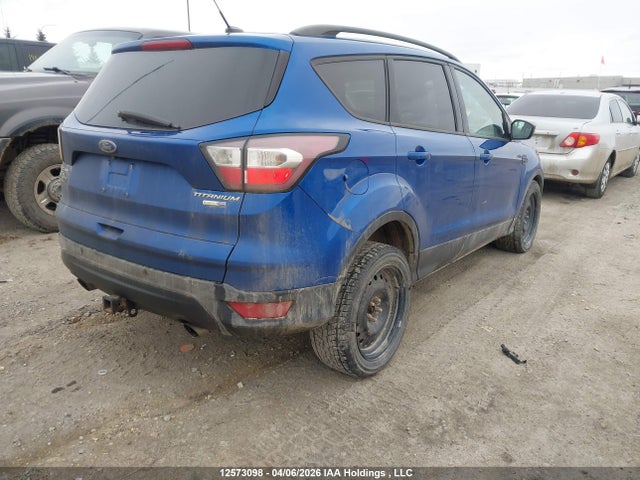12573098 :رقم المزاد ، 1FMCU9J97HUD70056 vin ، 2017 Ford Escape Titanium مزاد بيع