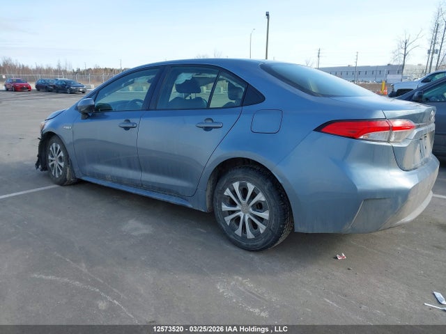 12573520 :رقم المزاد ، JTDBAMDE3MJ012453 vin ، 2021 Toyota Corolla Hybrid Base W/li Battery مزاد بيع