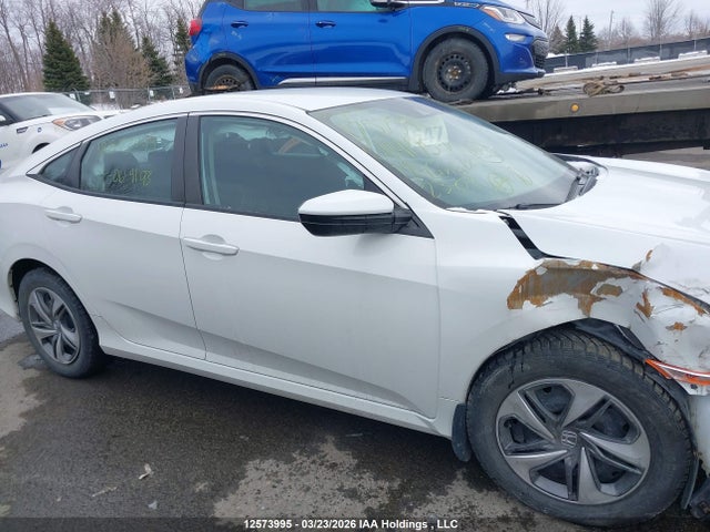 12573995 :رقم المزاد ، 2HGFC2E59KH004193 vin ، 2019 Honda Civic Lx مزاد بيع