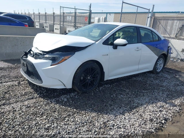 12574334 :رقم المزاد ، JTDBAMDE8MJ026185 vin ، 2021 Toyota Corolla Base W/li Battery/hybrid مزاد بيع