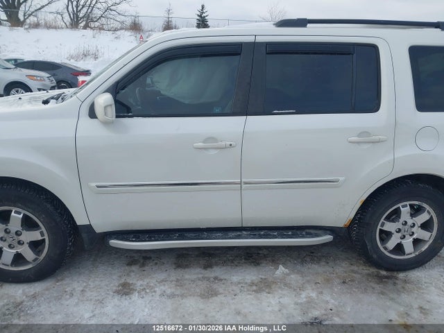12516672 :رقم المزاد ، 5FNYF4H94BB501568 vin ، 2011 Honda Pilot Touring مزاد بيع