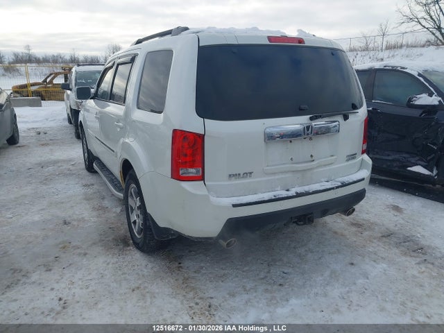 12516672 :رقم المزاد ، 5FNYF4H94BB501568 vin ، 2011 Honda Pilot Touring مزاد بيع
