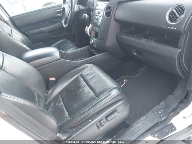 12516672 :رقم المزاد ، 5FNYF4H94BB501568 vin ، 2011 Honda Pilot Touring مزاد بيع