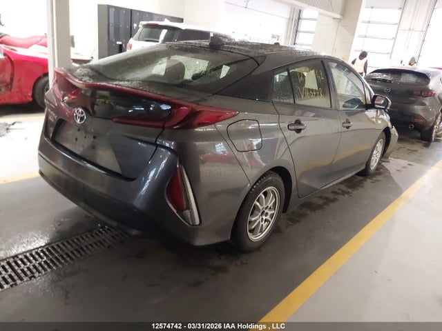 12574742 :رقم المزاد ، JTDKAMFP3M3163778 vin ، 2021 Toyota Prius مزاد بيع
