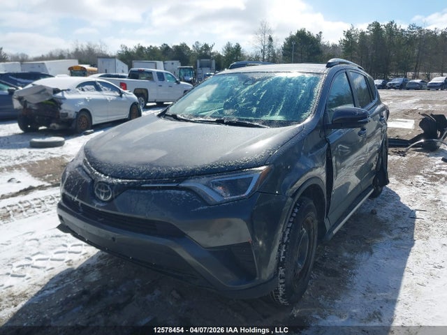 2T3BFREV0JW854242 Toyota RAV4 LE
