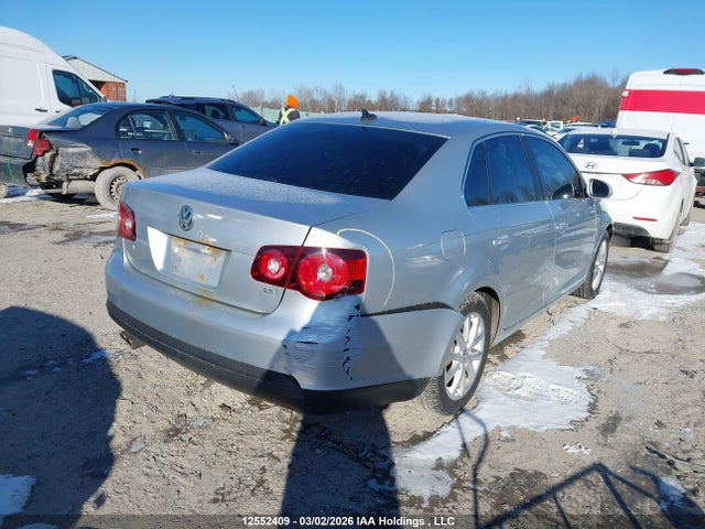2010 Volkswagen Jetta 2.5l Comfortline/2.5l Trendline მანქანა იყიდება აუქციონზე, vin: 3VWJX7AJ2AM073415, აუქციონის ნომერი: 12552409