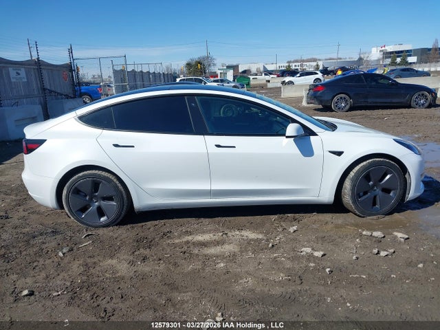 Продажа на аукционе авто 2022 Tesla Model 3, vin: 5YJ3E1EB0NF332706, номер лота: 12579301