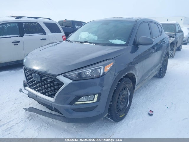 KM8J23A4XKU009359 Hyundai Tucson Essential