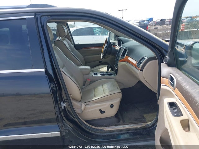 12581072 :رقم المزاد ، 1J4RR6GT4BC517944 vin ، 2011 Jeep Grand Cherokee Overland مزاد بيع