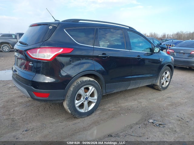 1FMCU9GX9EUE02104 Ford Escape