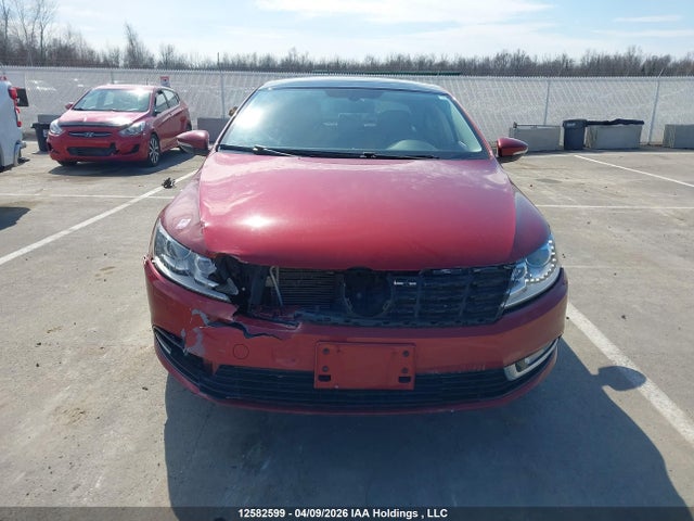 12582599 :رقم المزاد ، WVWBN7AN7EE523801 vin ، 2014 Volkswagen Passat Cc مزاد بيع