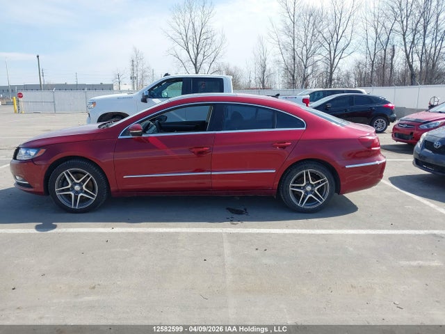 12582599 :رقم المزاد ، WVWBN7AN7EE523801 vin ، 2014 Volkswagen Passat Cc مزاد بيع