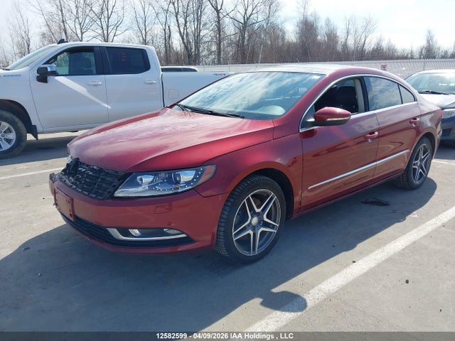12582599 :رقم المزاد ، WVWBN7AN7EE523801 vin ، 2014 Volkswagen Passat Cc مزاد بيع