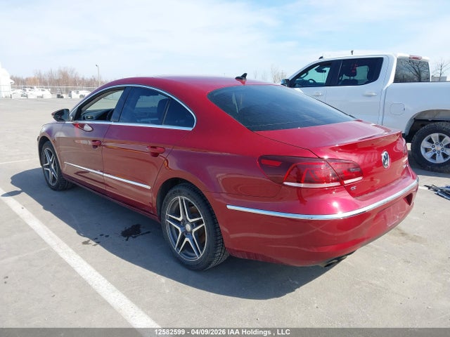 12582599 :رقم المزاد ، WVWBN7AN7EE523801 vin ، 2014 Volkswagen Passat Cc مزاد بيع