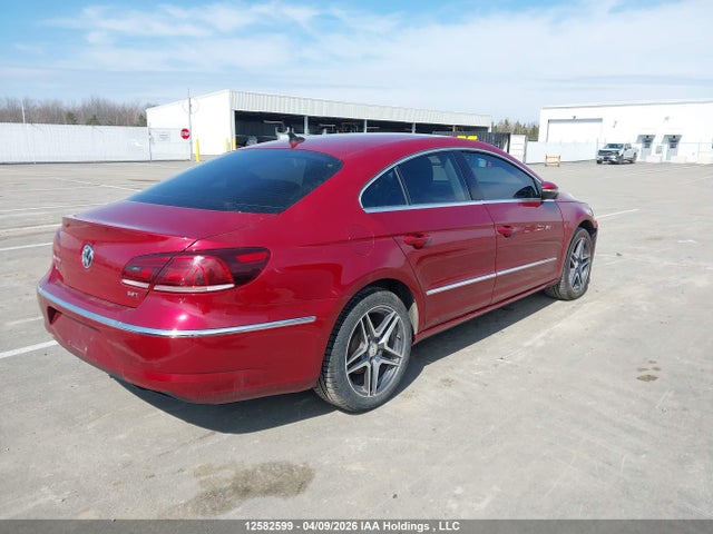 12582599 :رقم المزاد ، WVWBN7AN7EE523801 vin ، 2014 Volkswagen Passat Cc مزاد بيع