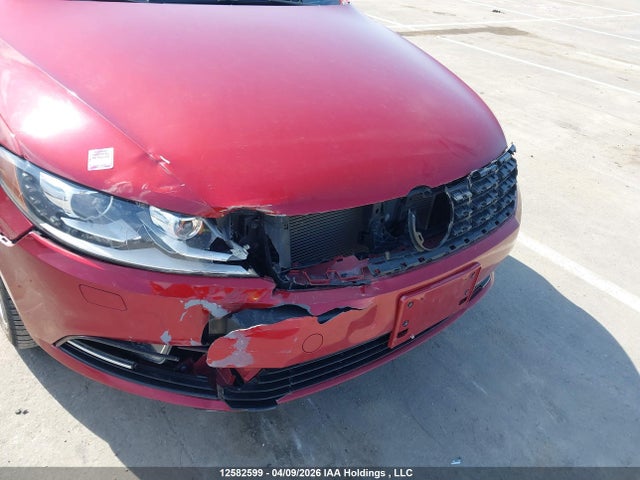 12582599 :رقم المزاد ، WVWBN7AN7EE523801 vin ، 2014 Volkswagen Passat Cc مزاد بيع