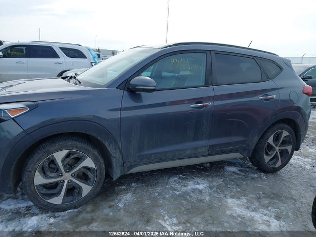 KM8J3CA26HU411898 Hyundai TUCSON SE