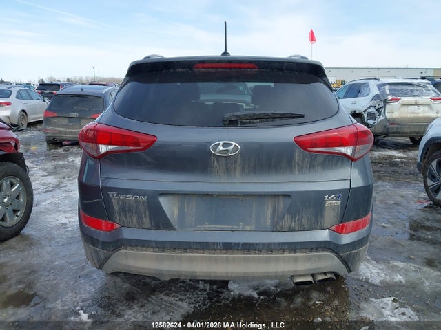 KM8J3CA26HU411898 Hyundai TUCSON SE