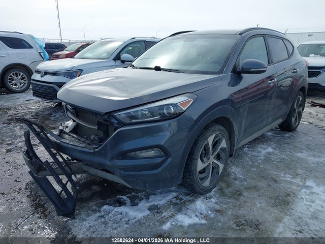 KM8J3CA26HU411898 Hyundai TUCSON SE