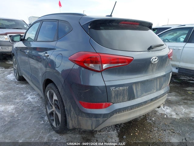 KM8J3CA26HU411898 Hyundai TUCSON SE