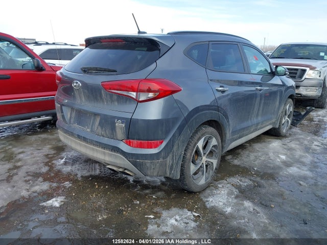 KM8J3CA26HU411898 Hyundai TUCSON SE