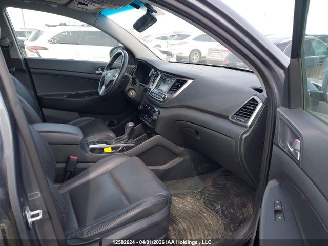 KM8J3CA26HU411898 Hyundai TUCSON SE