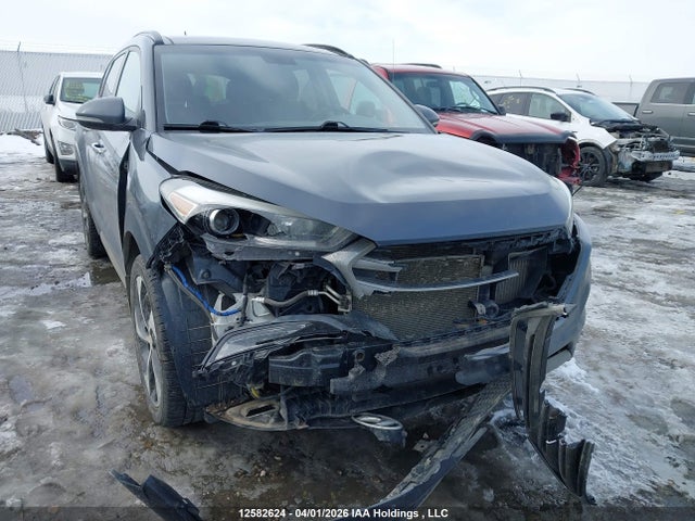 KM8J3CA26HU411898 Hyundai TUCSON SE