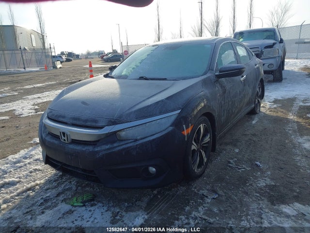 2016 Honda Civic Touring მანქანა იყიდება აუქციონზე, vin: 2HGFC1F91GH111791, აუქციონის ნომერი: 12582647