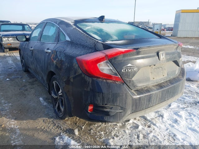 2016 Honda Civic Touring მანქანა იყიდება აუქციონზე, vin: 2HGFC1F91GH111791, აუქციონის ნომერი: 12582647