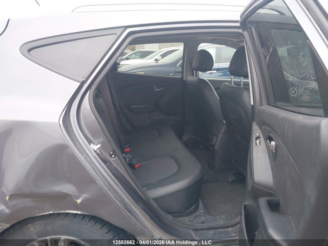 KM8JU3AG0EU900754 Hyundai TUCSON GLS