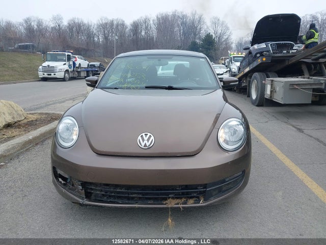 12582671 :رقم المزاد ، 3VWJ07AT4EM644253 vin ، 2014 Volkswagen Beetle مزاد بيع