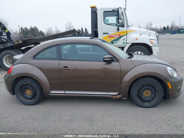 12582671 :رقم المزاد ، 3VWJ07AT4EM644253 vin ، 2014 Volkswagen Beetle مزاد بيع