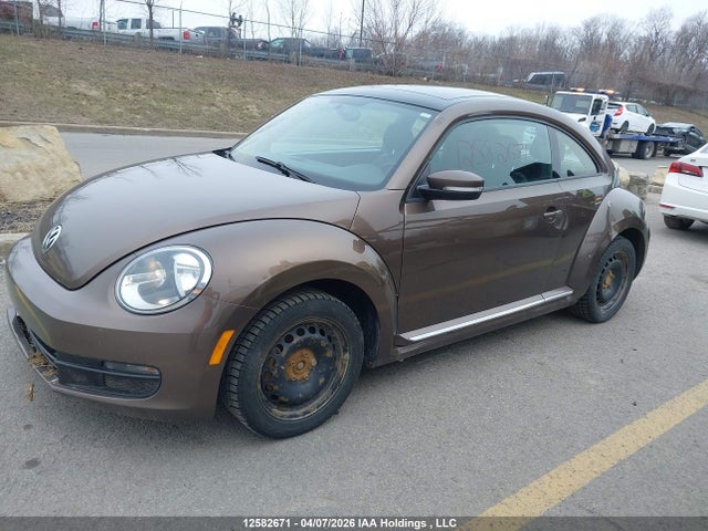 12582671 :رقم المزاد ، 3VWJ07AT4EM644253 vin ، 2014 Volkswagen Beetle مزاد بيع