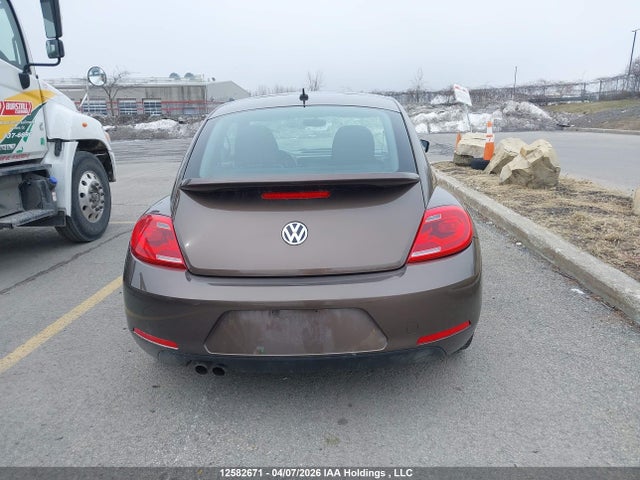 12582671 :رقم المزاد ، 3VWJ07AT4EM644253 vin ، 2014 Volkswagen Beetle مزاد بيع