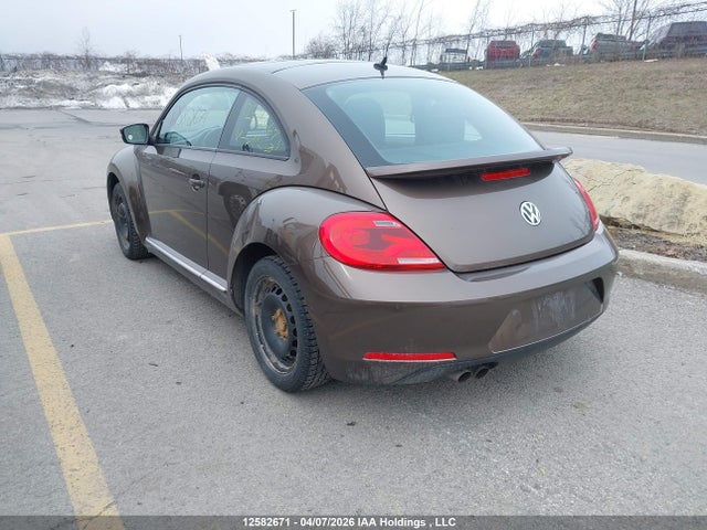 12582671 :رقم المزاد ، 3VWJ07AT4EM644253 vin ، 2014 Volkswagen Beetle مزاد بيع
