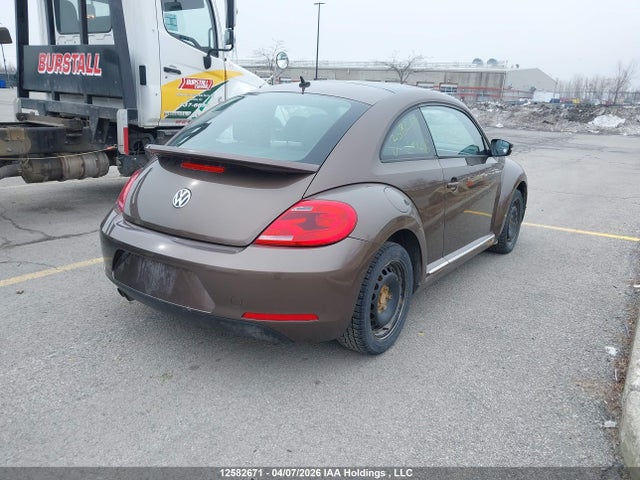 12582671 :رقم المزاد ، 3VWJ07AT4EM644253 vin ، 2014 Volkswagen Beetle مزاد بيع