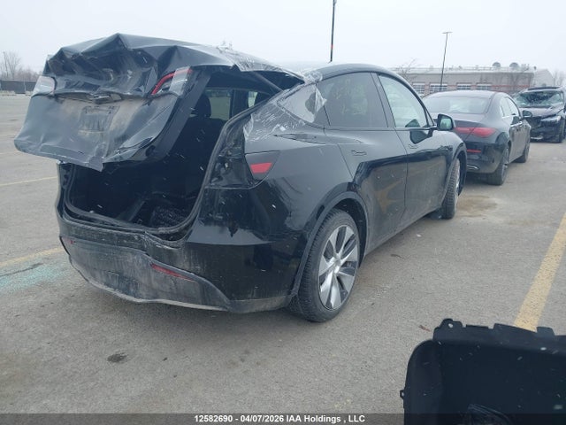 12582690 :رقم المزاد ، LRWYGDFD1PC221094 vin ، 2023 Tesla Model Y Rwd مزاد بيع