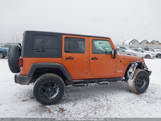 12582731 :رقم المزاد ، 1J4BA3H10AL189201 vin ، 2010 Jeep Wrangler Unlimited Sport مزاد بيع