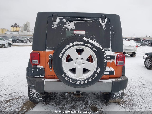 12582731 :رقم المزاد ، 1J4BA3H10AL189201 vin ، 2010 Jeep Wrangler Unlimited Sport مزاد بيع