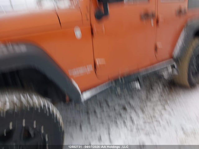 12582731 :رقم المزاد ، 1J4BA3H10AL189201 vin ، 2010 Jeep Wrangler Unlimited Sport مزاد بيع