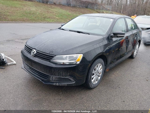3VWDK7AJ2EM390631 Volkswagen Jetta