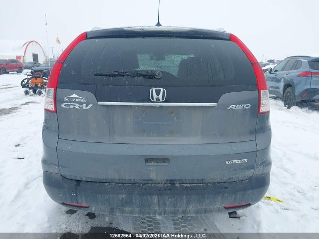 2014 Honda Cr-v Touring მანქანა იყიდება აუქციონზე, vin: 2HKRM4H96EH116447, აუქციონის ნომერი: 12582954