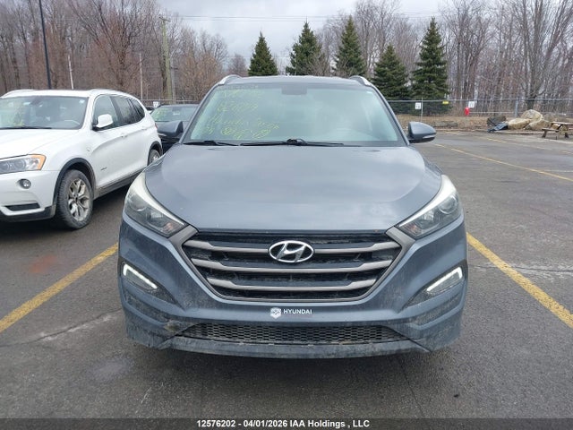 KM8J33A4XGU182609 Hyundai Tucson Premium